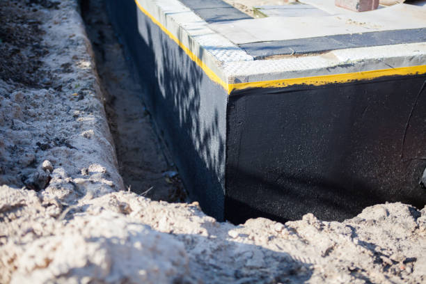 Professional Wet Basement Repair technician working in Montague, MI